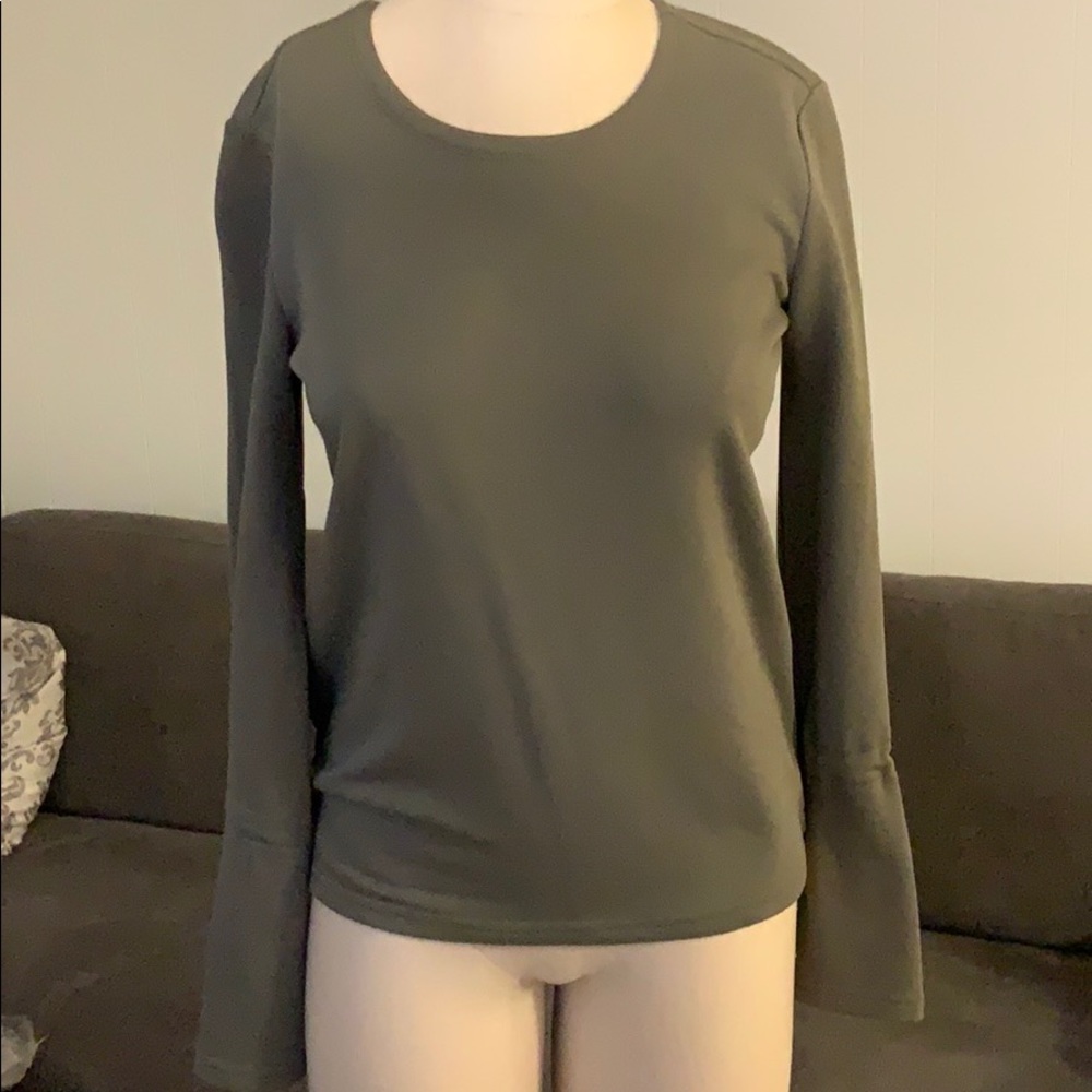 Long sleeve shirt with belled sleeves. NWOT